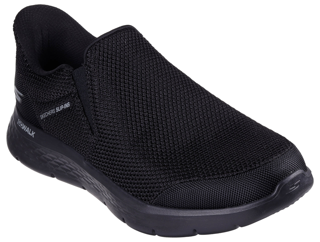 Black slip-on walking shoe with mesh upper and black sole, and text "GO WALK" and "SLIP-INS" on the side.