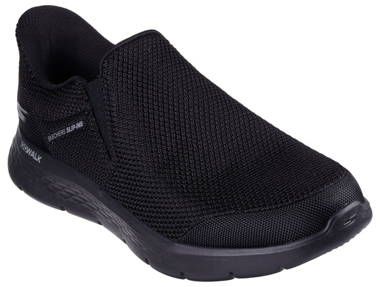 Black slip-on walking shoe with mesh upper and black sole, and text "GO WALK" and "SLIP-INS" on the side.