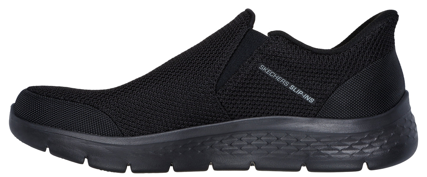 A black mesh slip-on sneaker with "SKECHERS SLIP-INS" written on the side.