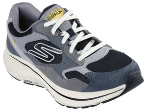 A gray and black running shoe with white laces and a white 'S' logo on the side.