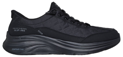 A black sneaker with laces and a thick sole. "SKECHERS SLIP-INS" and "CONTOUR FOAM" are printed on the side of the shoe.