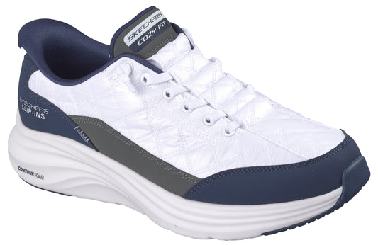 A white sneaker with floral pattern, navy blue accents, “COZY FIT” on the tongue, and “SLIP-INS” on the side.