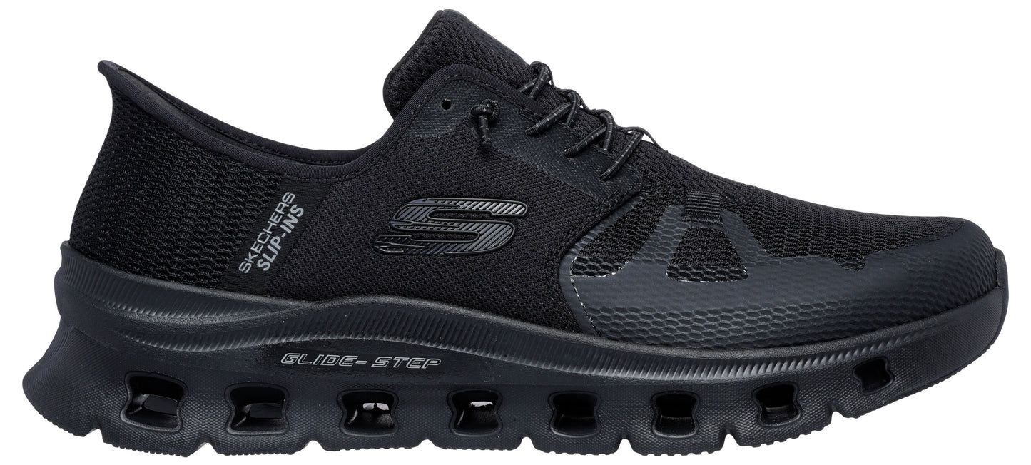 A black sneaker with a mesh upper and elastic laces.