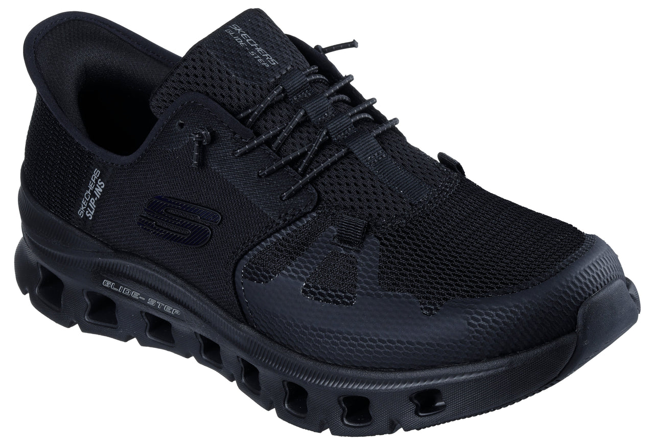 Black sneaker with mesh upper, toggle laces, and midsole with cutout details.