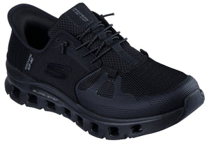 Black sneaker with mesh upper, toggle laces, and midsole with cutout details.