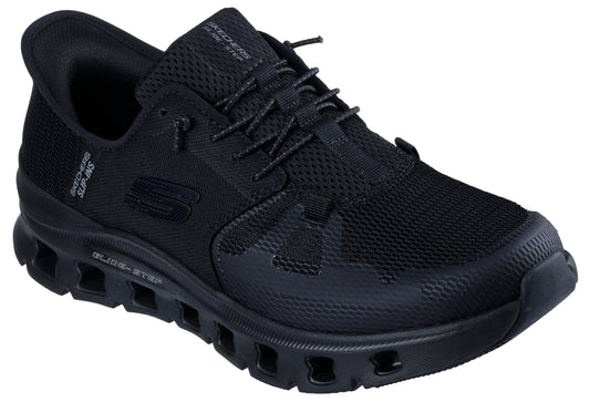Black sneaker with mesh upper, toggle laces, and midsole with cutout details.