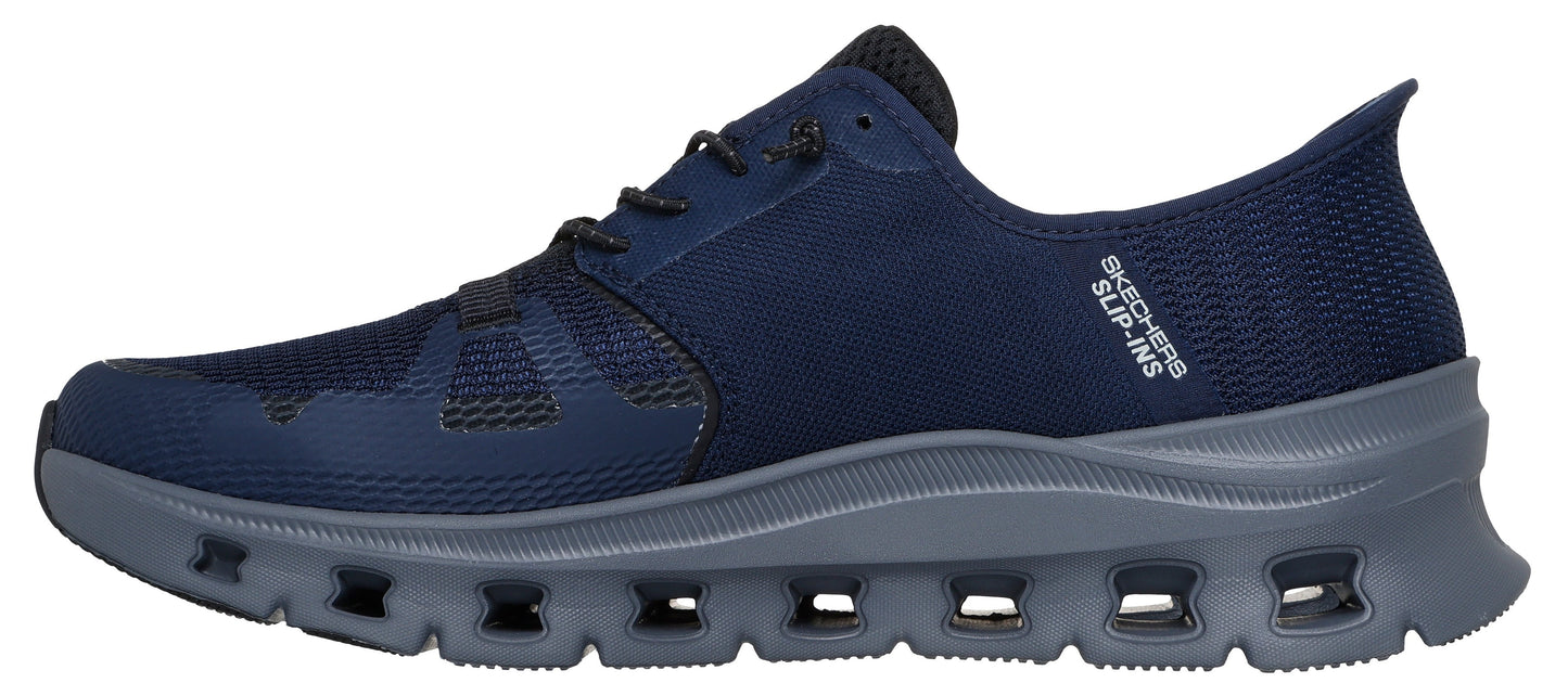 A navy blue shoe with gray soles.