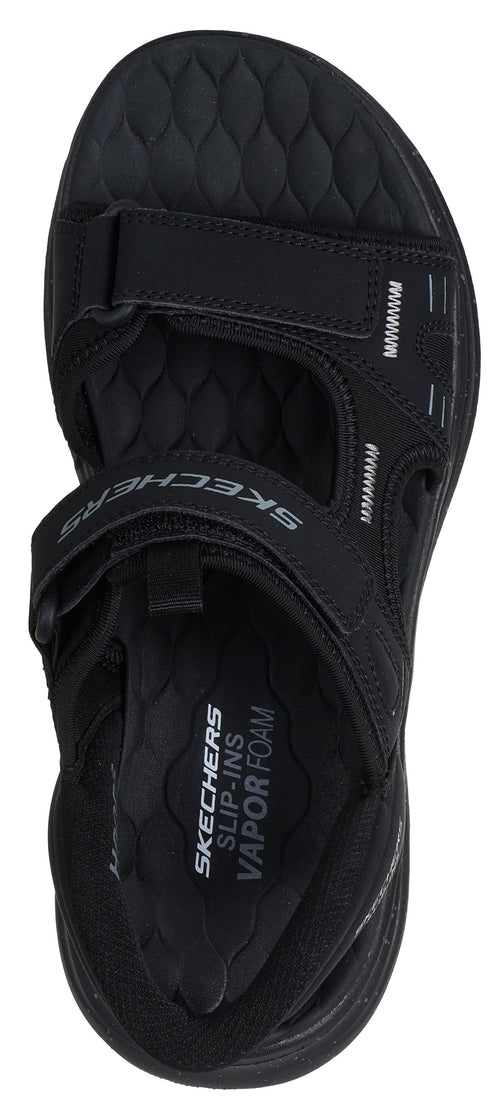 a black sandal with two straps and hook-and-loop closures