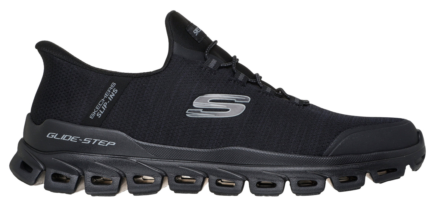 A black slip-on shoe with visible Glide-Step logo.