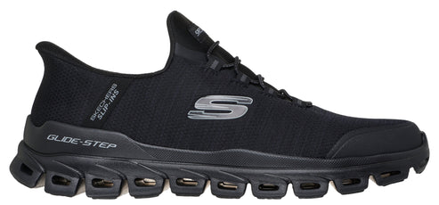 A black slip-on shoe with visible Glide-Step logo.