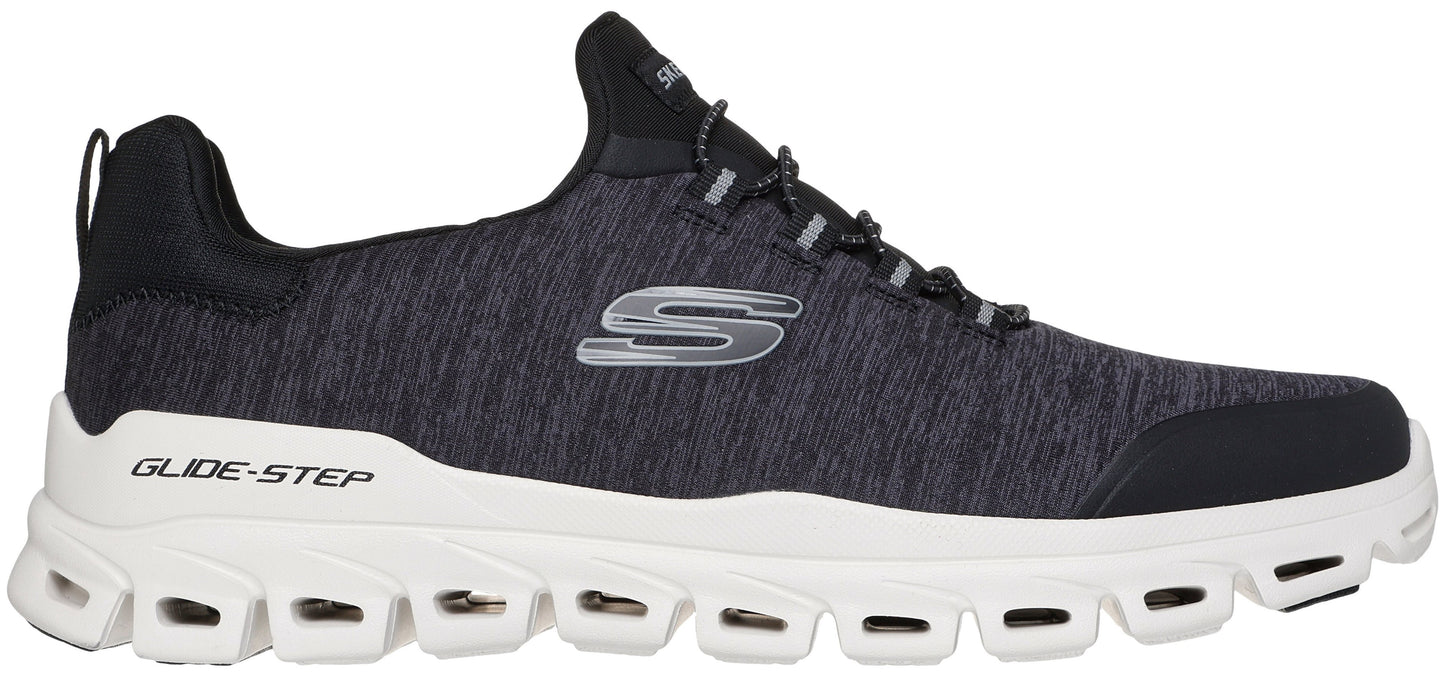 A charcoal gray fabric running shoe with a white, heavily segmented, thick foam sole labeled "GLIDE-STEP" on the heel and a silver "S" logo on the side.