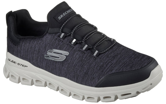 A gray and black slip-on athletic shoe with a white, geometric-patterned Glide-Step sole and a prominent S logo on the side.