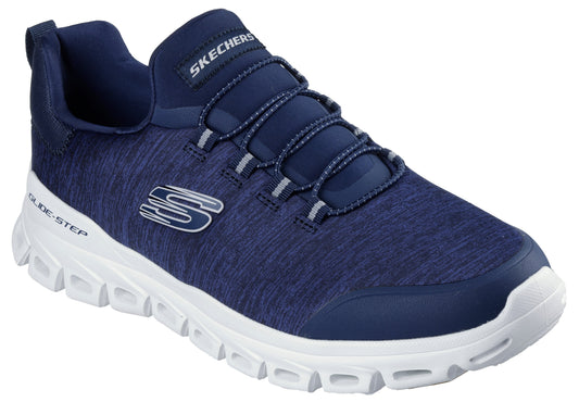 Low top sneaker with white textured soles, navy blue upper, stretch laces, and 'SKECHERS' text.