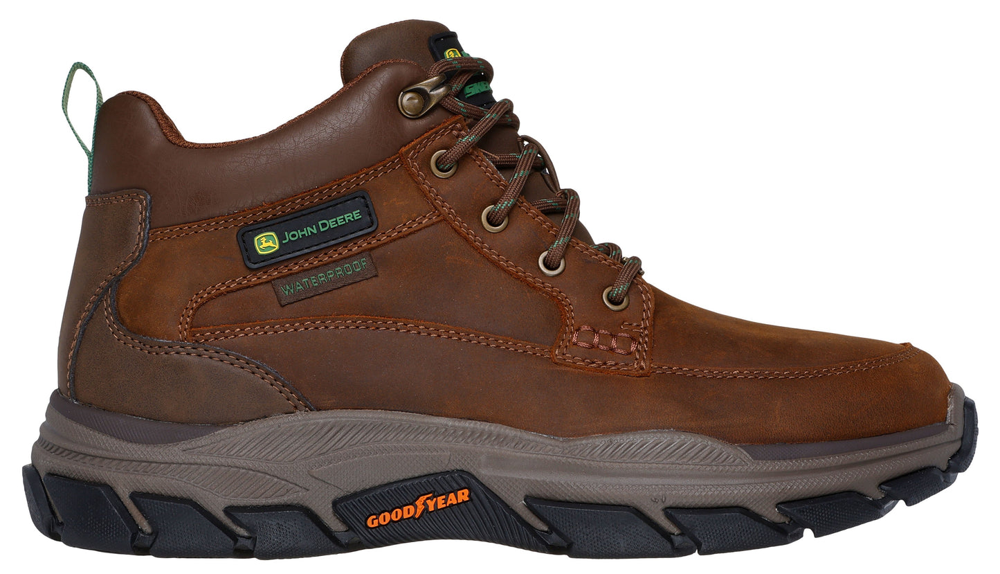 Brown leather high-top work boot with metal eyelets and a Goodyear logo.
