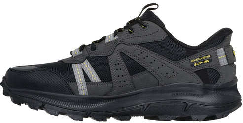 A black and gray hiking shoe with a slip-ins label.