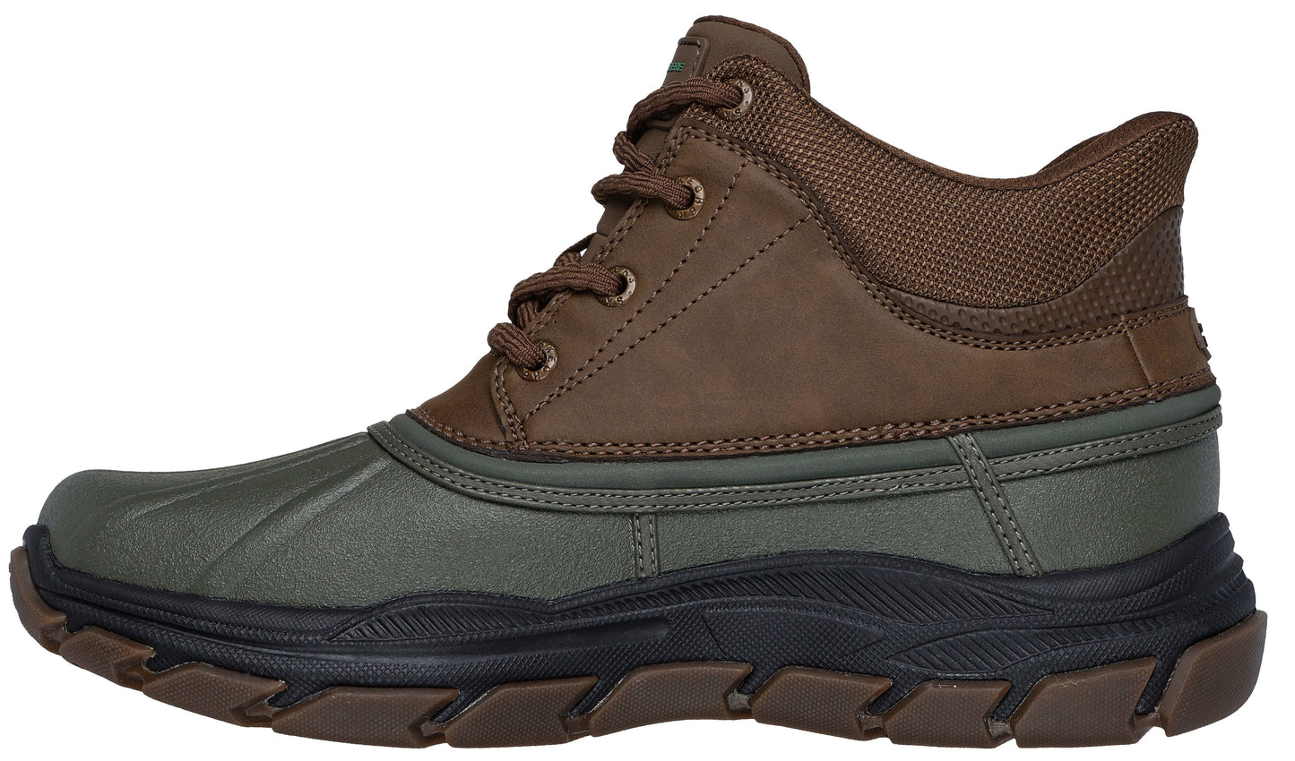 A high-top boot with an olive green lower, brown upper, lace-up closure, and black sole.