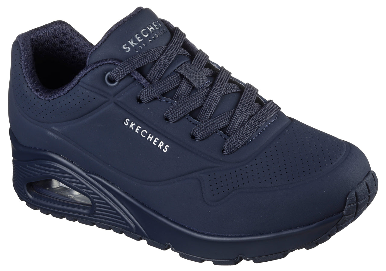 Navy blue sneaker with "SKECHERS LOS ANGELES" on the tongue and "SKECHERS" on the side.