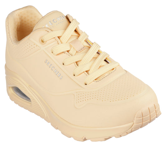 Tan sneaker with air cushioned heel and tone-on-tone laces.
