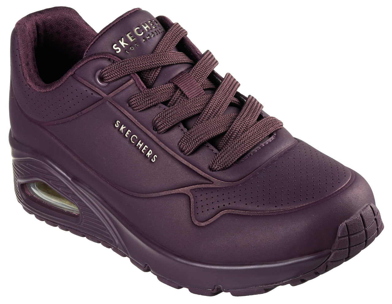 A plum-colored sneaker with laces, a visible air pocket in the heel, and the text "SKECHERS LOS ANGELES" and "SKECHERS" visible on the upper.
