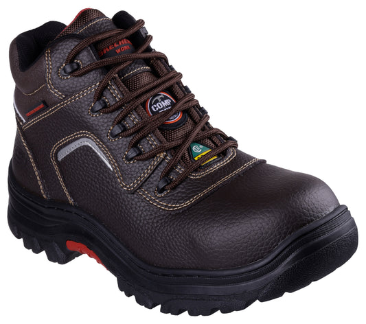 A brown leather work boot with a composite toe, lace-up closure, high ankle support, and a black sole with red accents.