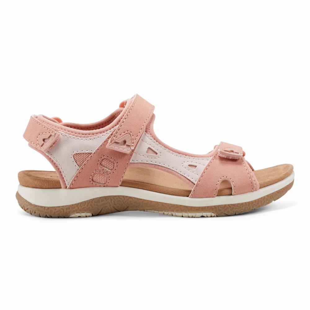 Pink sandal with adjustable velcro straps and thick beige sole.