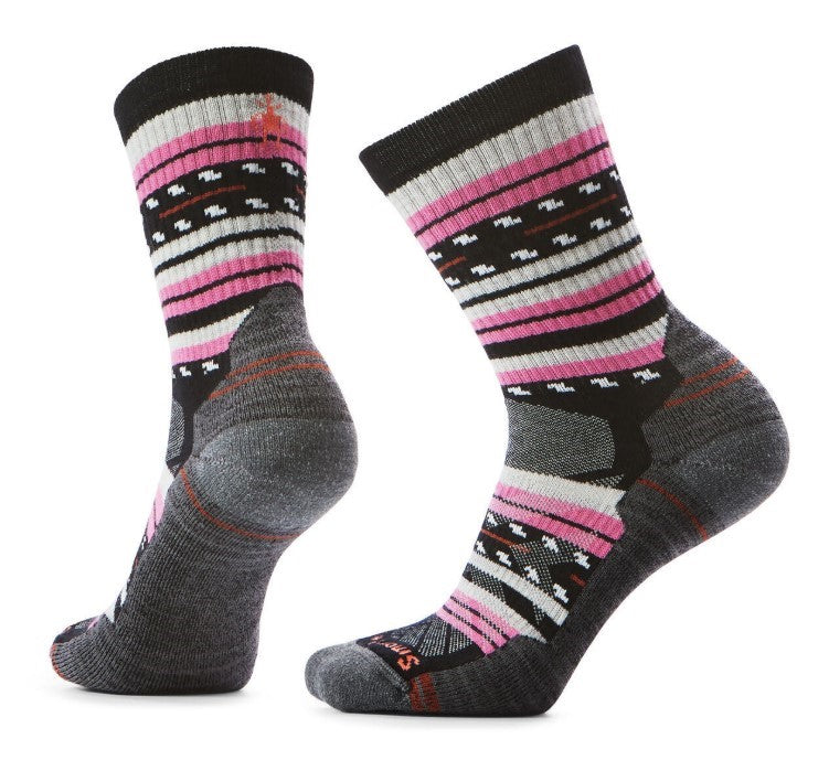 A pair of gray socks with black cuffs, white and pink stripes, and a geometric pattern.