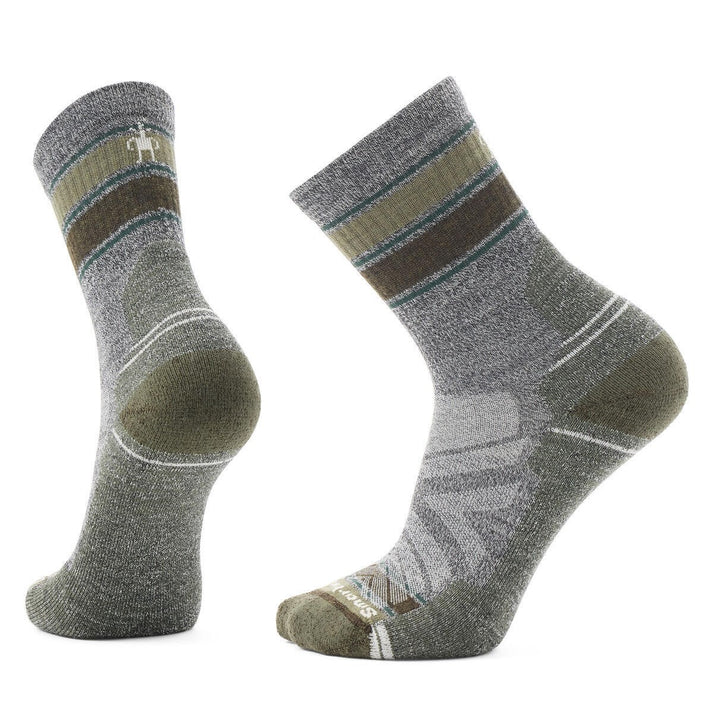 Pair of gray crew socks featuring green and brown stripes.