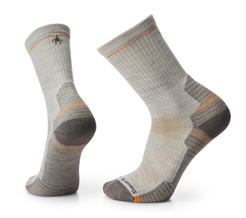 Two beige wool crew socks, with gray toe, heel and sole.