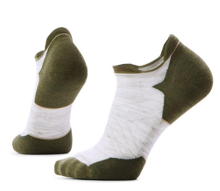 Two no-show socks, one on its side and one standing up, with dark green toes and heels, and a white body.