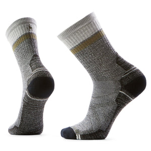 A pair of gray hiking socks with a cushioned heel and toe. Each sock has a grey cuff with a gold ring below it.