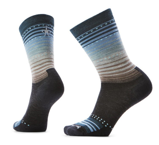 Pair of crew socks, blue to tan gradient with stripes and dots.