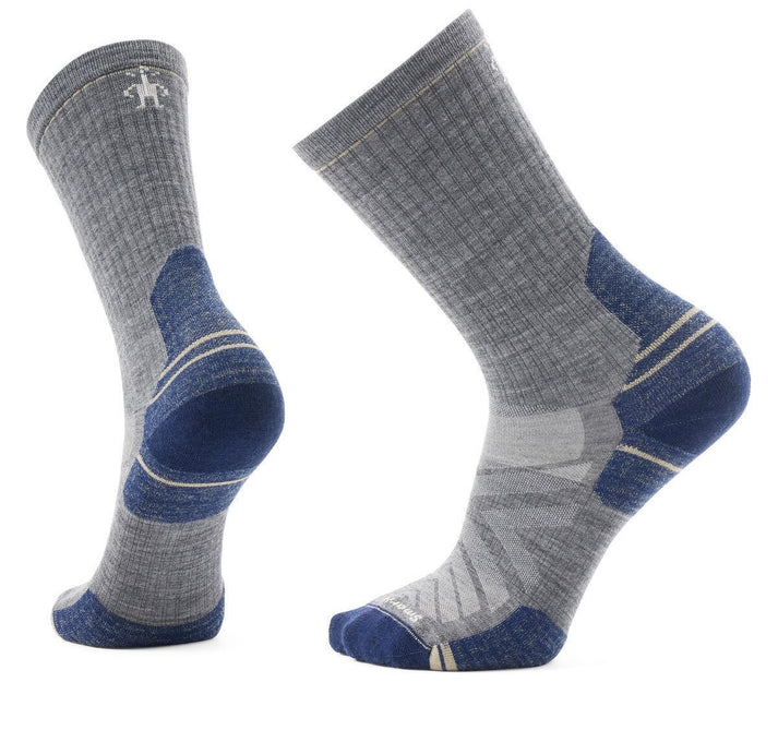 Two gray socks with blue heels and toes, showing the logo near the top of one sock.