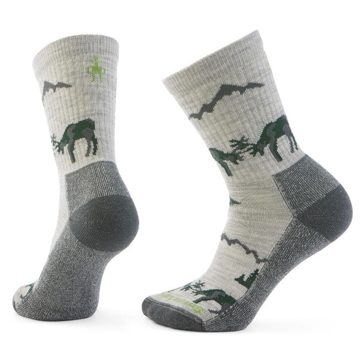 Pair of socks with a gray heel and toe, featuring a mountain landscape and deer.