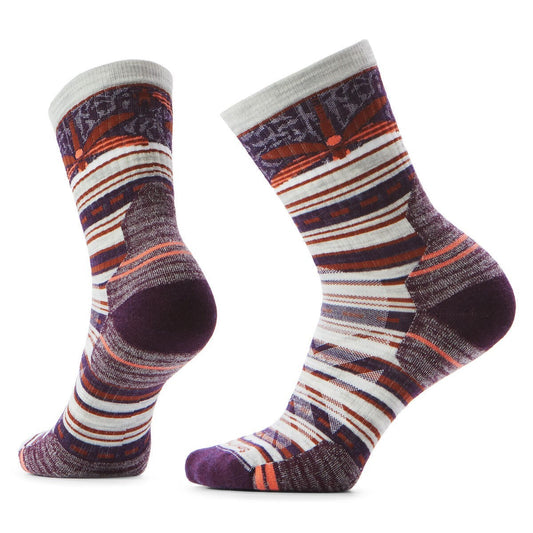 Pair of patterned crew socks in stripes of purple, white, orange, and grey, with floral accent.