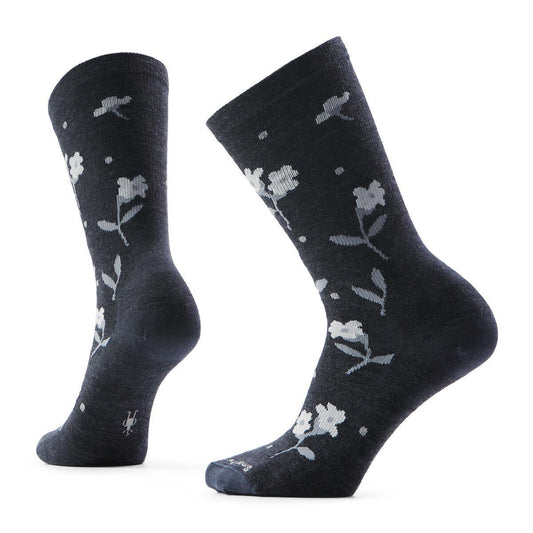 Pair of black crew socks with gray floral pattern.