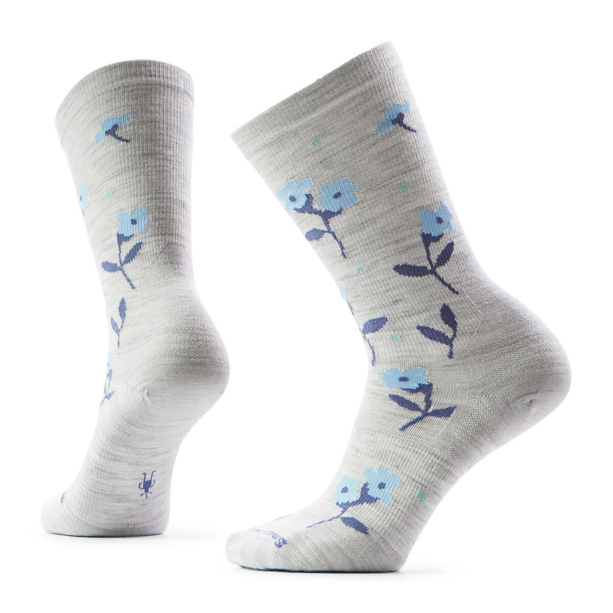 Two light gray socks with blue flower patterns.
