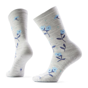 Two light gray socks with blue flower patterns.