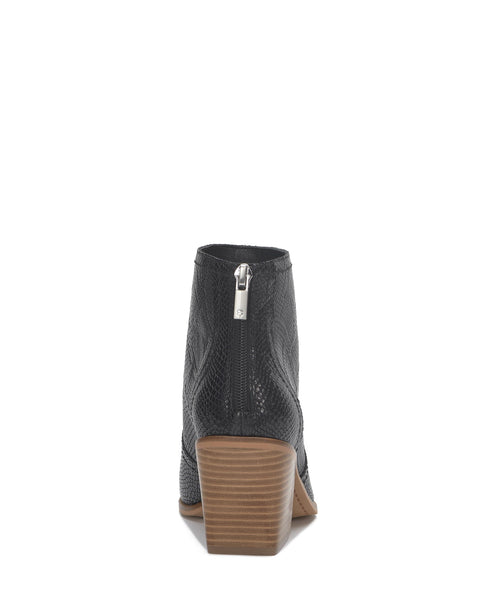 Black ankle boot with wood-look heel.