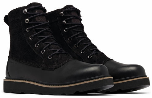 A pair of ankle-high black leather boots with corduroy trim and laces.