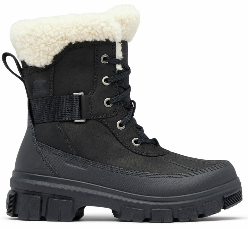 Black waterproof boot with faux fur trim and lug sole, featuring lace-up closure and buckle strap.