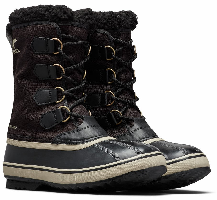 A pair of tall snow boots with black and brown uppers, cream-colored midsoles, black bottoms, and black laces.