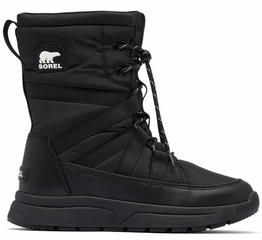 A black tall boot with laces, a white patch with "SOREL" and a bear logo, a black pull tab on the back, and straps.