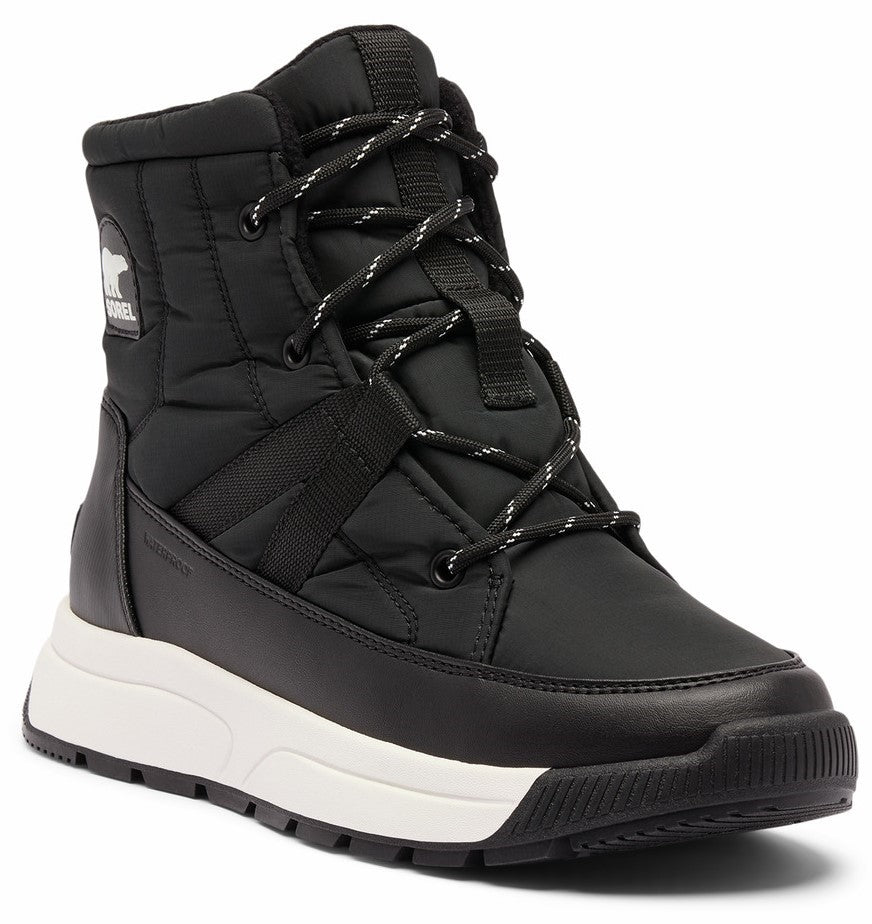 Black quilted, waterproof boot with black and white laces and a white platform sole, a white logo patch is present on the side.