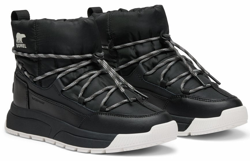 A pair of puffy black boots with gray and white laces, featuring a visible text "SOREL" on the side.