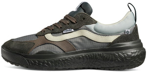 A shoe with a dark sole, brown laces, a gray toe cap, a cream side stripe, and a gray heel.