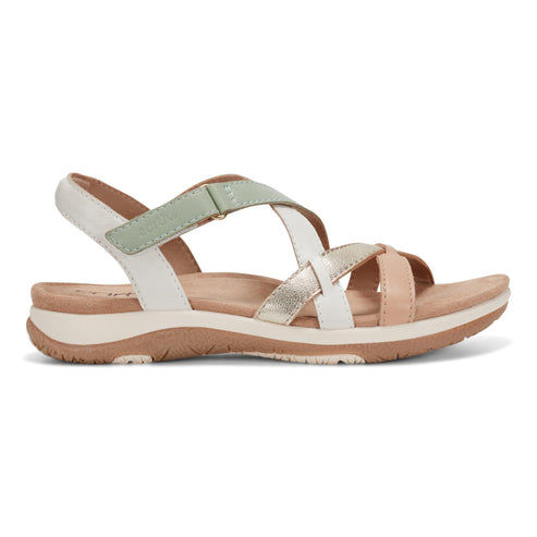 Side view of a sandal featuring straps in white, blush, gold, and light green, with a beige sole and footbed.