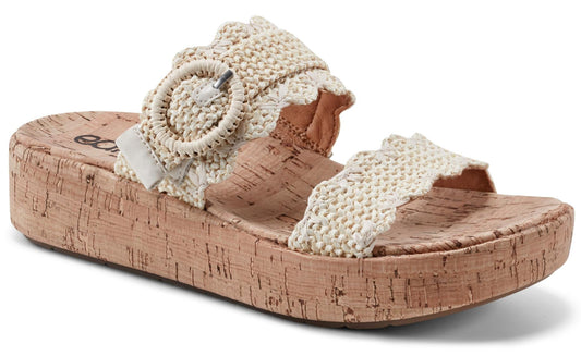 Cork platform sandals with knit straps and decorative buckle.