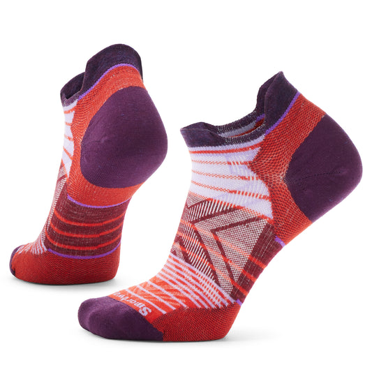 Pair of athletic socks, red, purple, and white geometric pattern, low cut style.