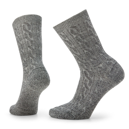 Two gray wool socks with cable knit pattern.