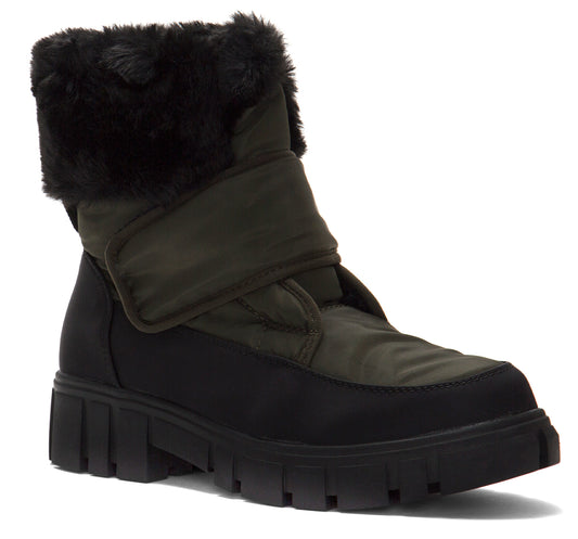 Olive green and black boot with faux fur trim and lug sole.